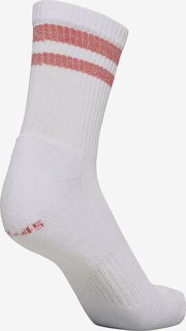 Chaussettes de sport Hummel en blanc