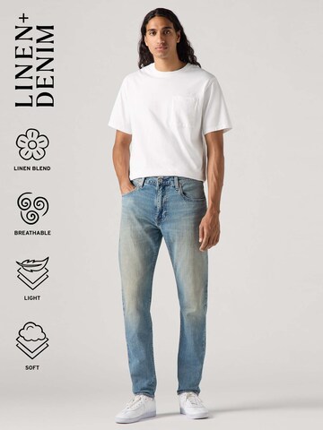 LEVI'S ® Tapered Jeans '512' in Blue: front