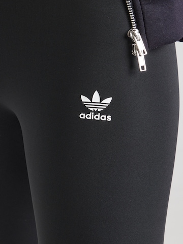 Skinny Leggings 'ESS' di ADIDAS ORIGINALS in nero