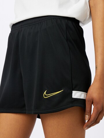 NIKE Regular Sports trousers in Black