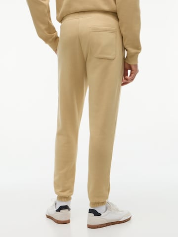 Effilé Pantalon Tommy Jeans en beige
