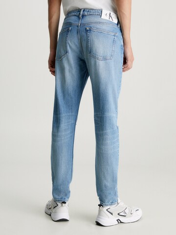 Coupe slim Jean 'SLIM TAPER' Calvin Klein Jeans en bleu