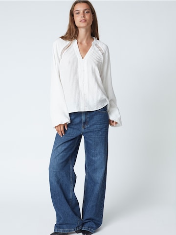 Chemisier 'Shina' co'couture en blanc