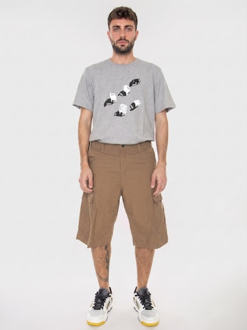 Carhartt WIP Luźne Spodnie 'Buffalo' w kolorze brązowy: przód