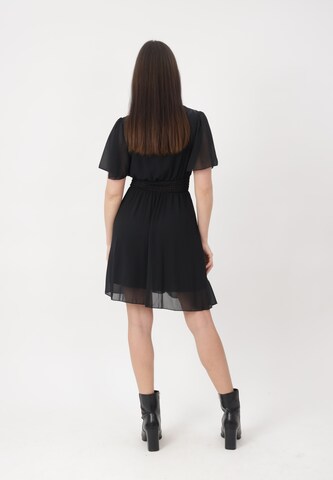 Robe de cocktail Elara en noir