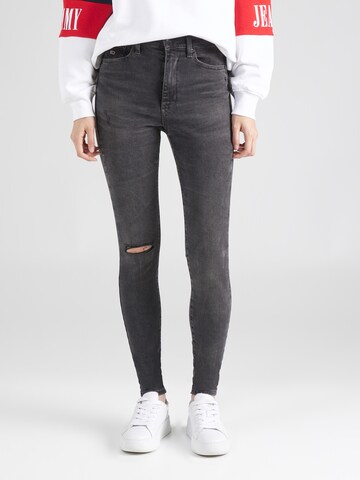 Skinny Jeans 'SYLVIA HIGH RISE SKINNY' de la Tommy Jeans pe gri: față