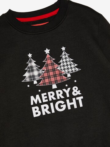 Pullover 'Christmas Crew Merry & Bright' di Threadboys in nero