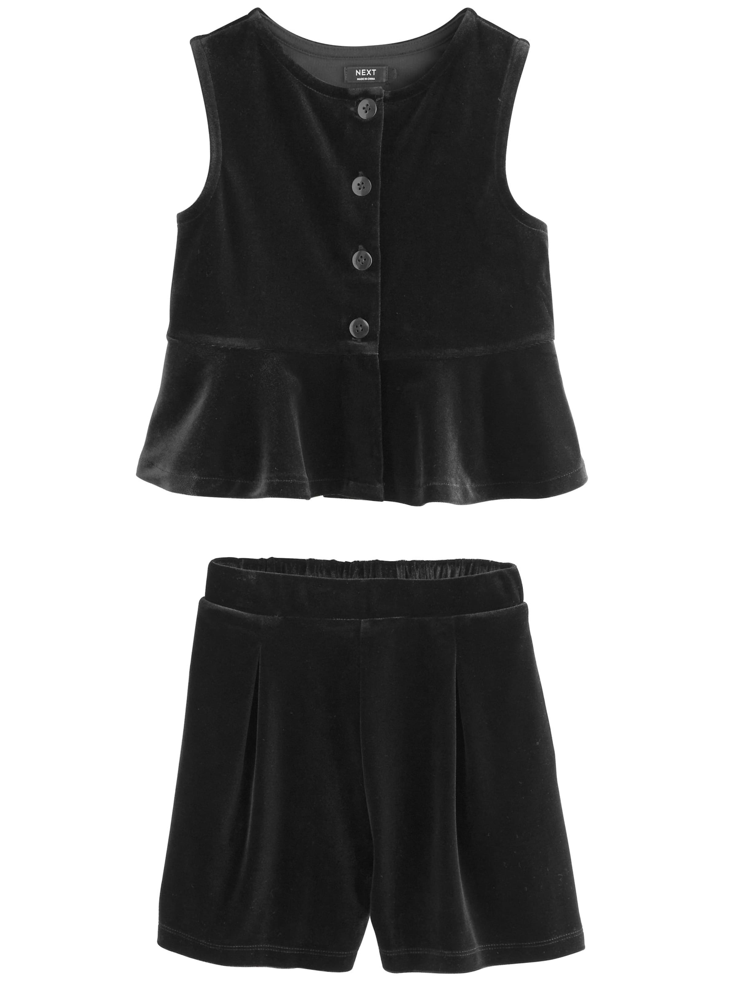 Next Setti värissä musta: etupuoli