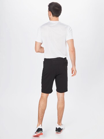 Hummel Regular Workout Pants 'Ray 2.0' in Black