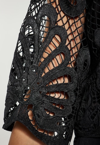 Camicia da donna di faina in nero