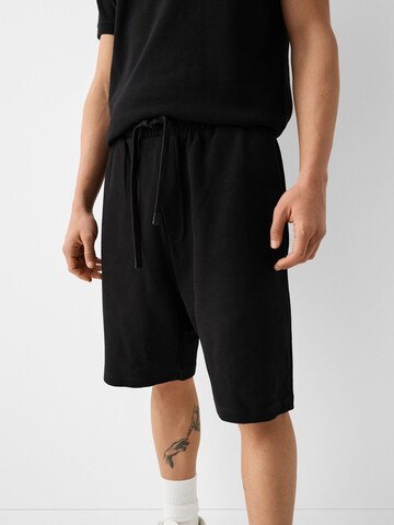 Largi Pantaloni de la Bershka pe negru