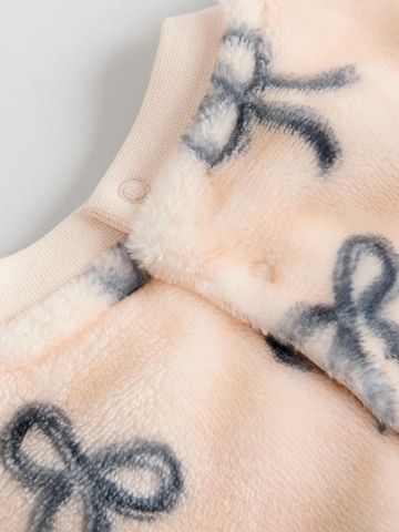 Set Next en rose