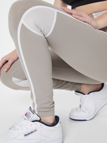 Reebok Skinny Športne hlače | siva barva