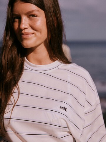 self. Shirts i blå