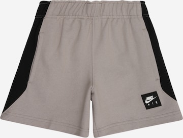 pilka Nike Sportswear Standartinis Kelnės 'AIR': priekis