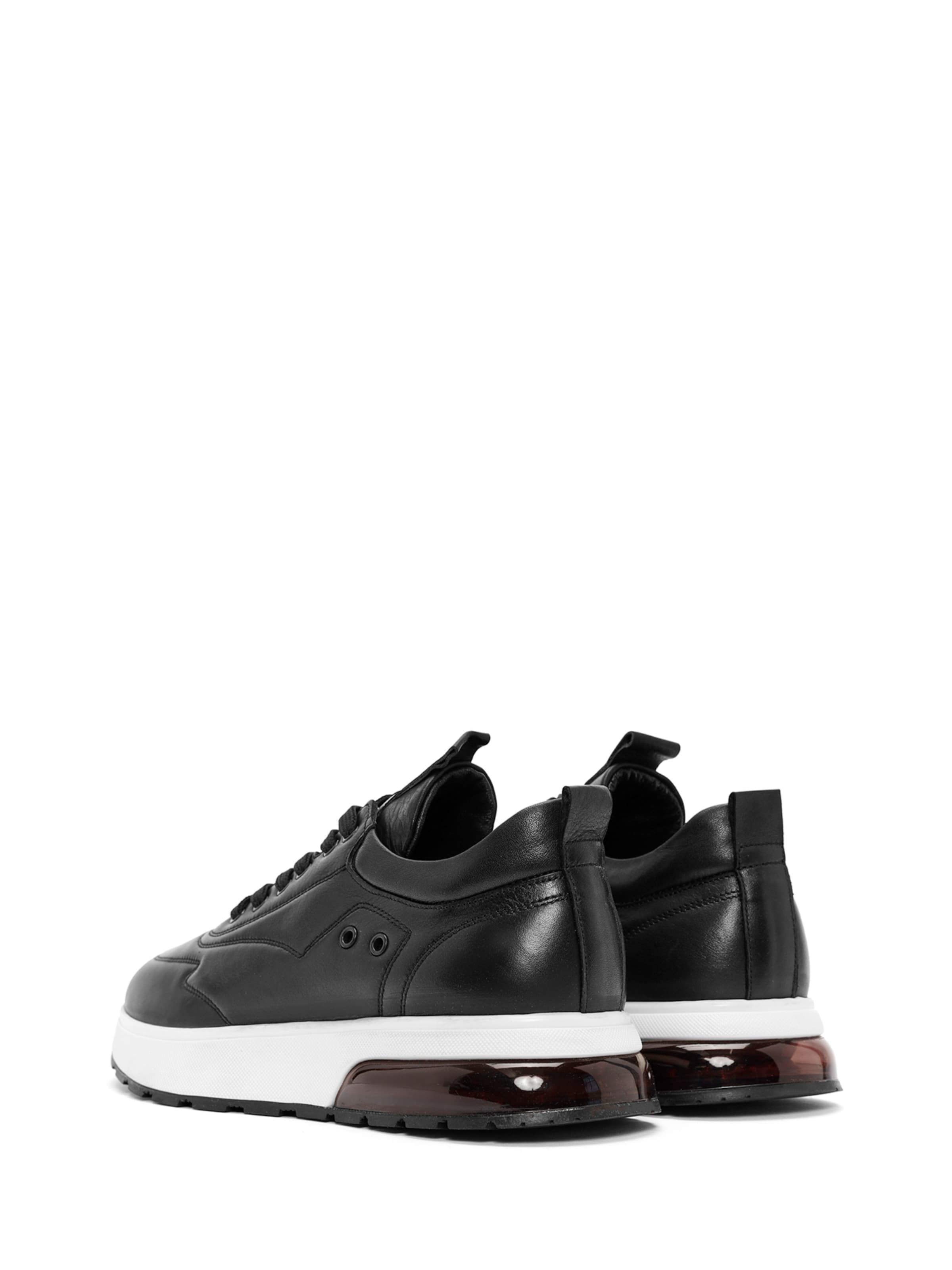 Baskets basses Derimod en noir