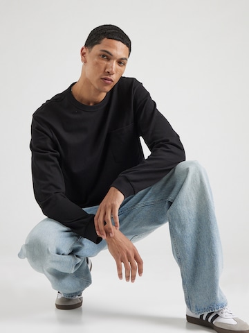 GAP T-shirt i svart: framsida