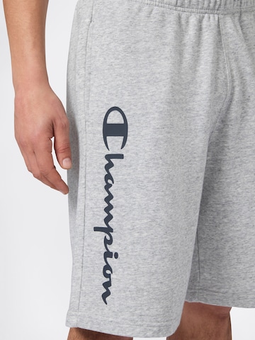Champion Authentic Athletic Apparel Lużny krój Spodnie w kolorze szary