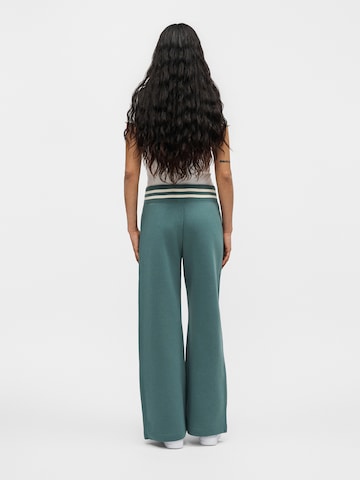 Nike Sportswear Szeroka nogawka Spodnie 'PHX' w kolorze zielony