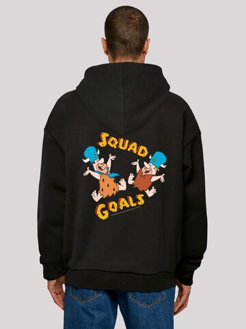 F4NT4STIC Sweatshirt 'The Flintstones Squad Goals Familie Feuerstein' in Schwarz: Vorderseite
