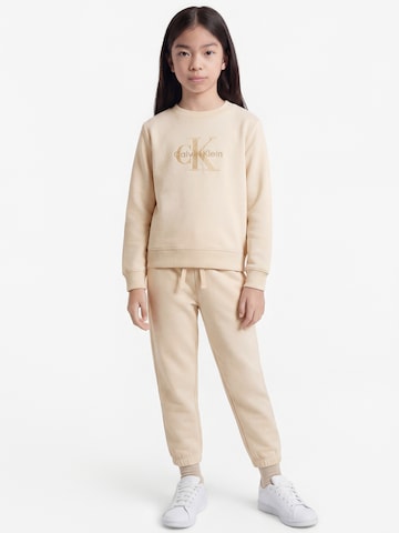Survêtement Calvin Klein Jeans en beige : devant