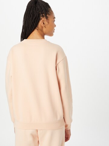 Champion Authentic Athletic Apparel Sweatshirt in Pink