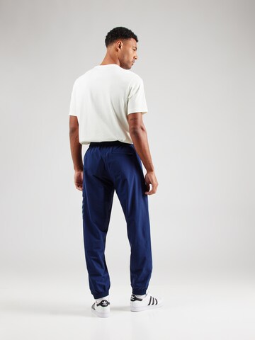 ADIDAS ORIGINALS Tapered Trousers in Blue