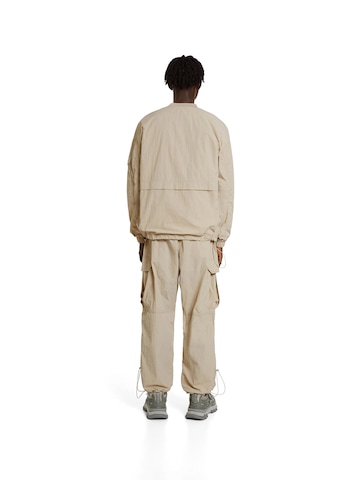 Bershka Tapered Cargobroek in Beige