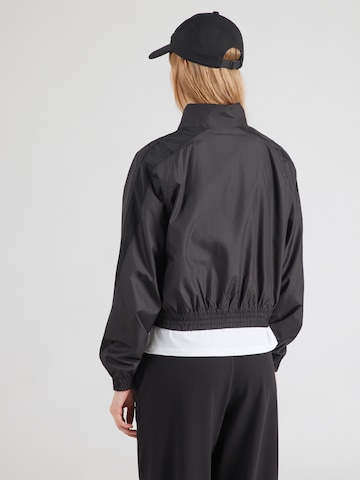UNDER ARMOUR Athletic Jacket 'Woven' in Black