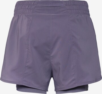 NIKE Regular Athletic Pants in Purple