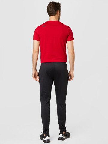 Tapered Pantaloni sportivi di 4F in nero