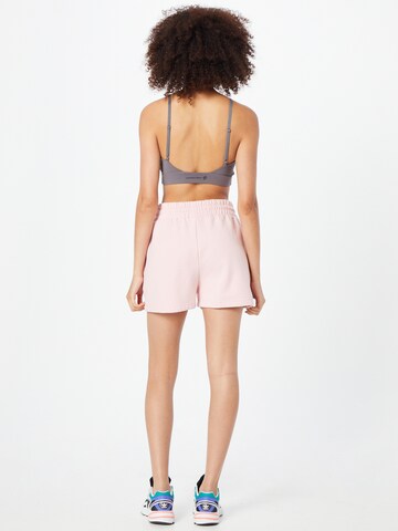 Regular Pantalon Karl Kani en rose