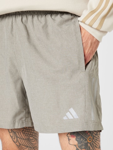 ADIDAS PERFORMANCE Regular Workout Pants 'Own The Run Heather' in Green