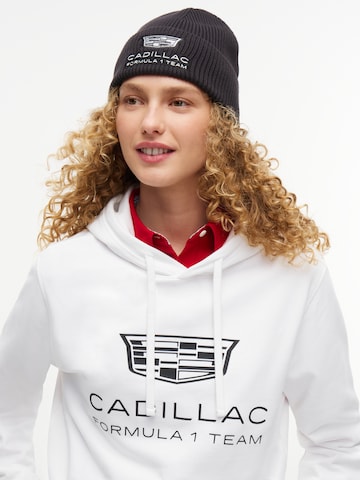 juoda TOMMY HILFIGER Megzta kepurė 'TH X CF1 Replica'