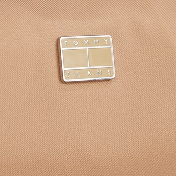 Tommy Jeans Schoudertas 'Iconic' in Bruin