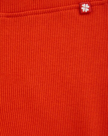 WE Fashion Regular Leggingsit värissä oranssi