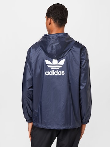 ADIDAS ORIGINALS - Chaqueta de entretiempo en azul