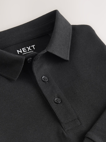 Tricou de la Next pe negru