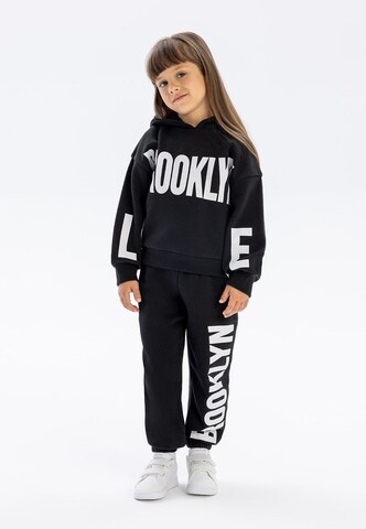 Set di MINOTI in nero: frontale