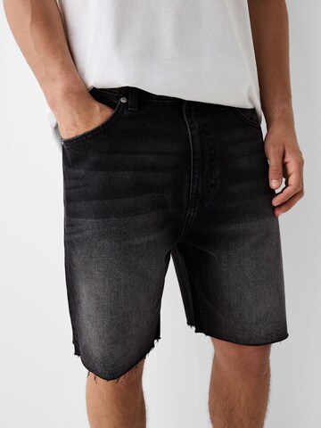 regular Jeans di Bershka in nero