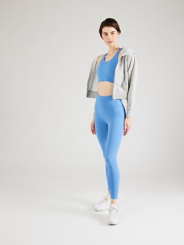 Athlecia Skinny Sportbroek 'Aideny' in Blauw