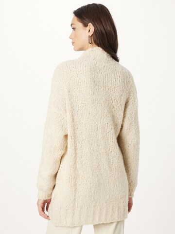 Cartoon Knit cardigan in Beige