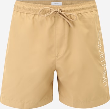 Calvin Klein Swimwear Board Shorts in Beige: front