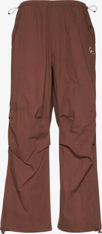 Karl Kani Loose fit Pants in Brown: front