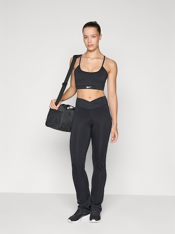 Reebok Flared Sportbyxa i svart