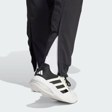 ADIDAS PERFORMANCE Tapered Workout Pants 'Walk-On' in Black