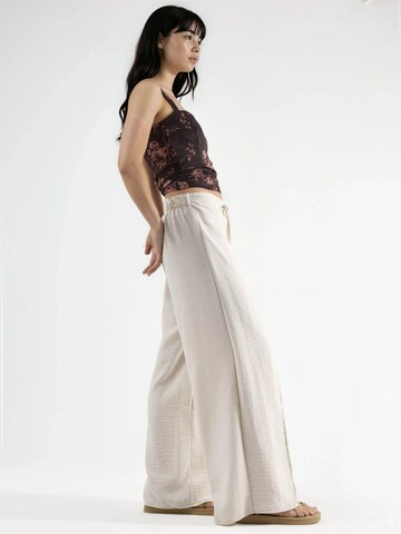 Wide leg Pantaloni di Busem in beige