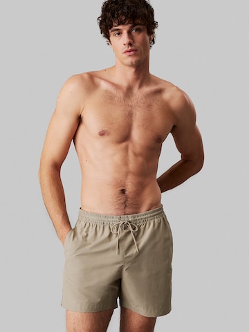 Calvin Klein Swimwear Board Shorts in Grey: front