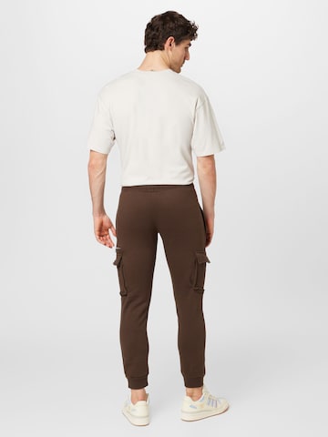 BURTON MENSWEAR LONDON Tapered Cargo trousers in Brown