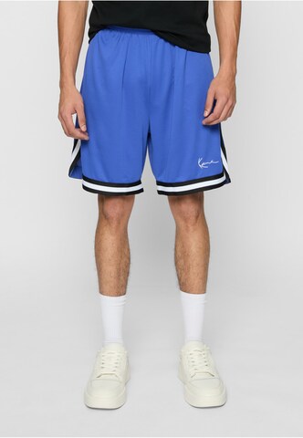Karl Kani - Loosefit Calças 'Essential' em azul: frente